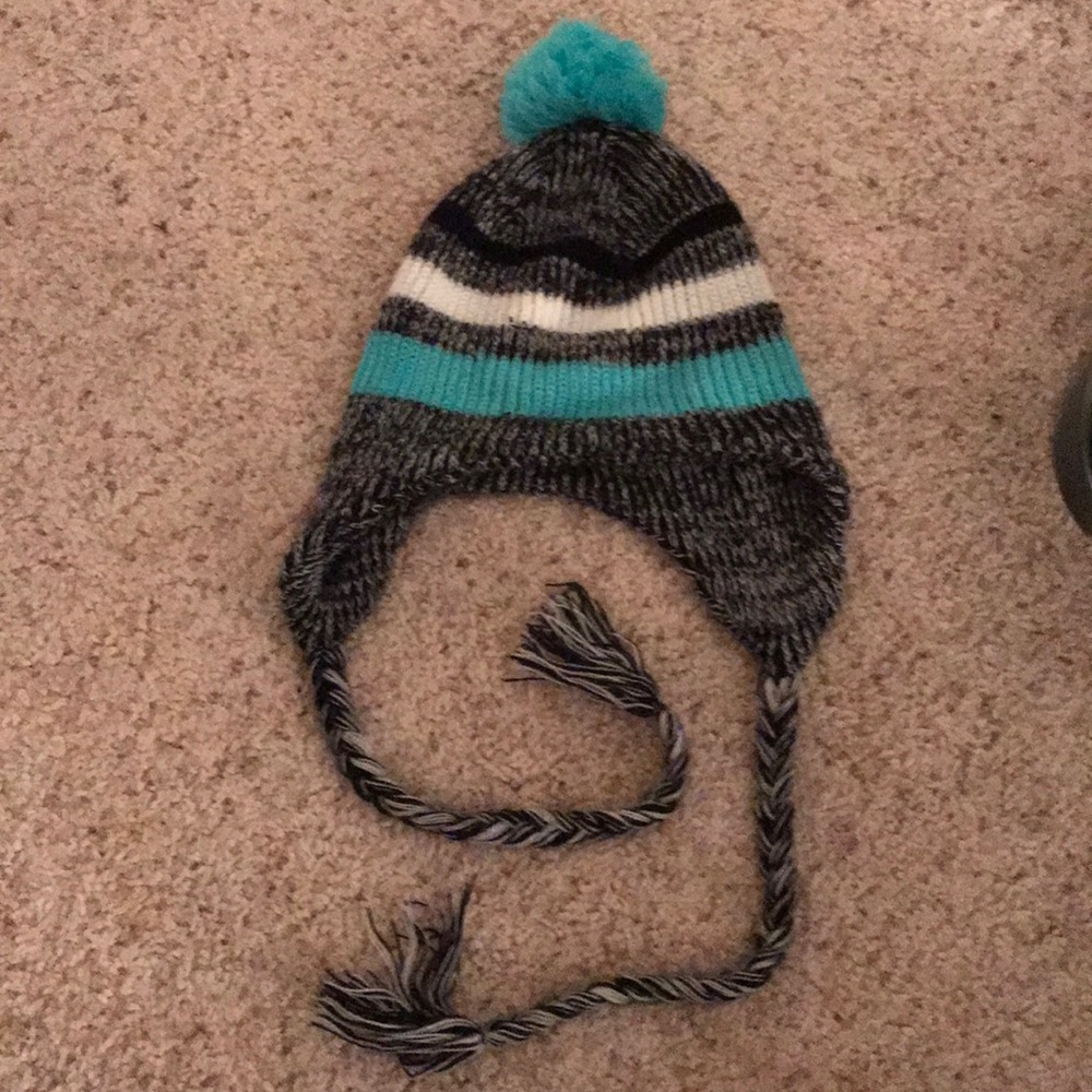 Never worn Beanie with tassels